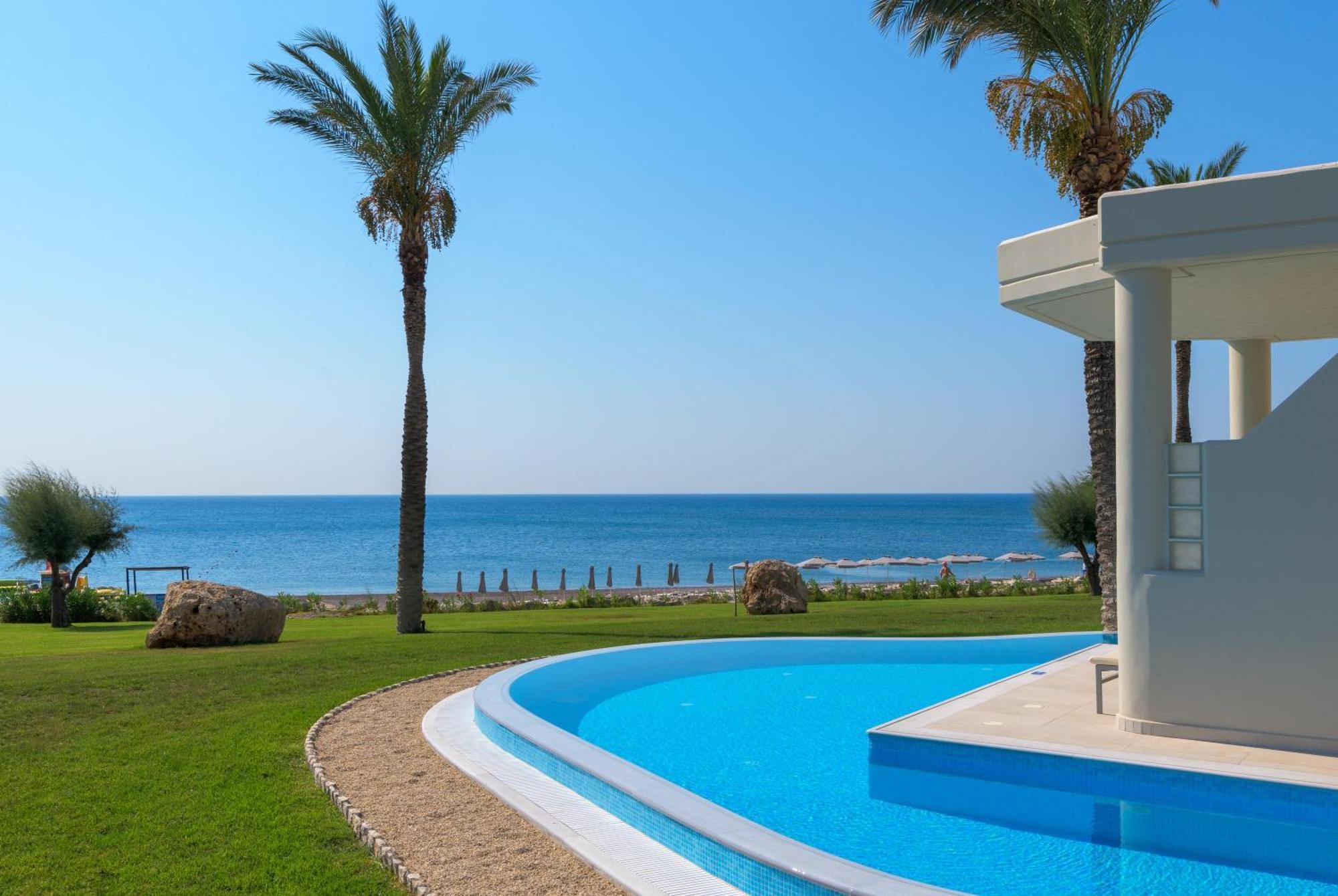 فندق رودوس بالاديوم ليجر آند ويلنيس Kallithéa المظهر الخارجي الصورة A swimming pool in Cyprus