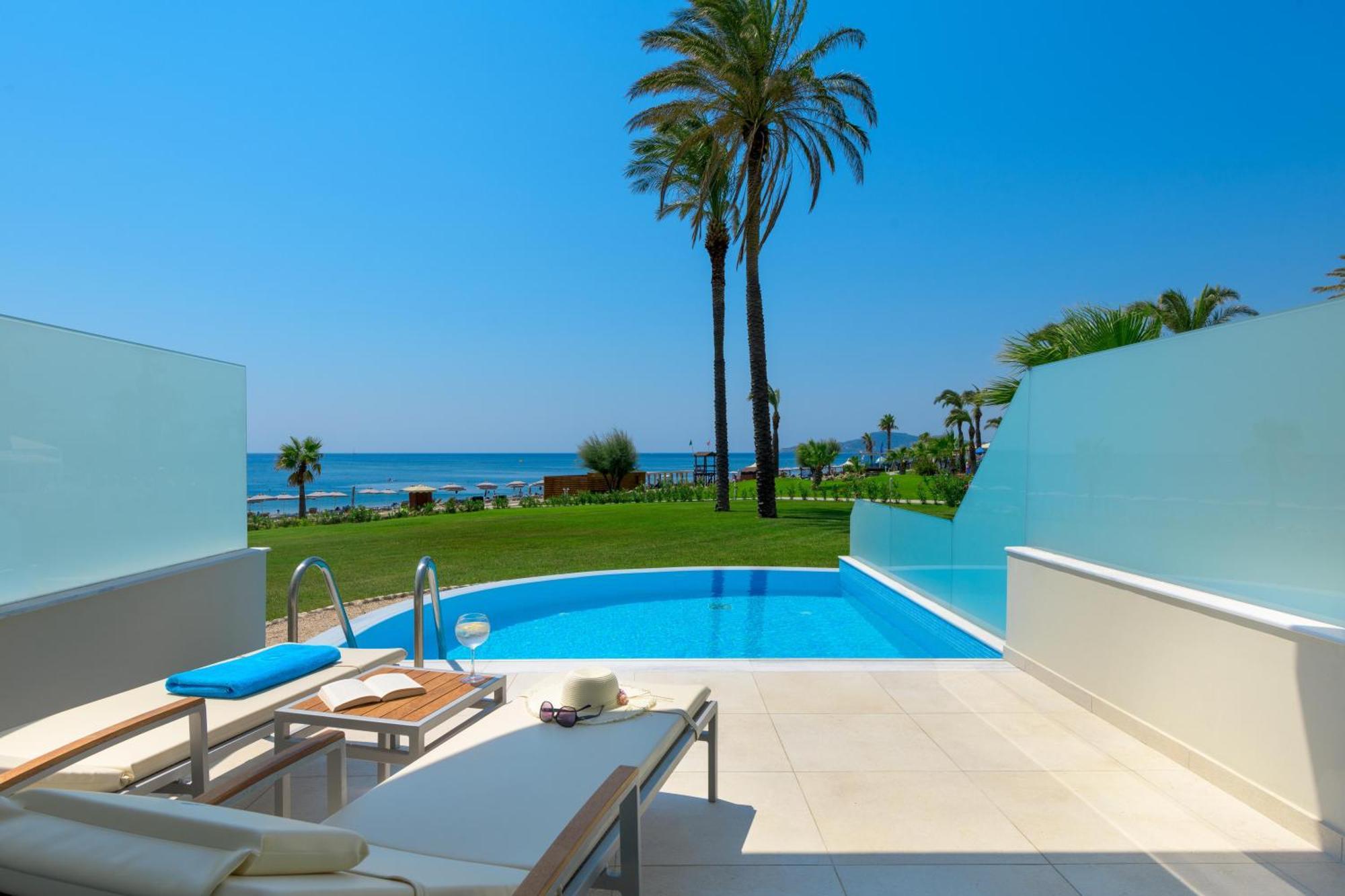 فندق رودوس بالاديوم ليجر آند ويلنيس Kallithéa المظهر الخارجي الصورة A private pool at a hotel in Crete, Greece